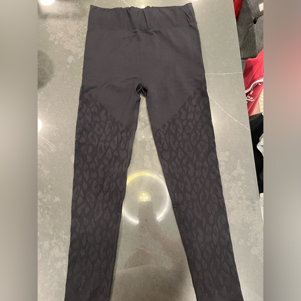 Brand NWT Fabletics leggings with open-work sheet animal print detail 7/8 length